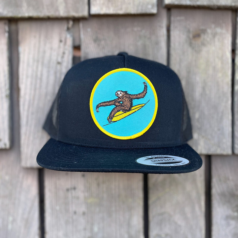 Load image into Gallery viewer, Jonas Draws Surfing Sloth Patch Hat - Black
