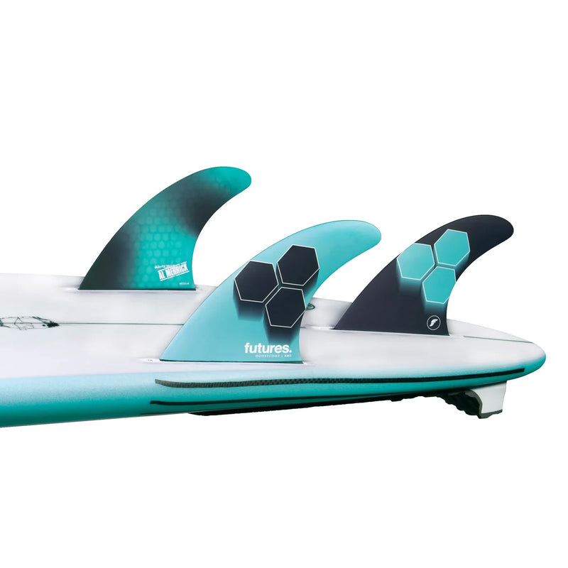 Load image into Gallery viewer, Futures AM1 HC Thruster Fin Set - Teal / Navy - On Board
