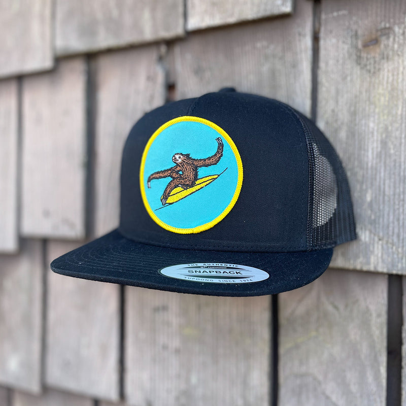 Load image into Gallery viewer, Jonas Draws Surfing Sloth Patch Hat - Black Side
