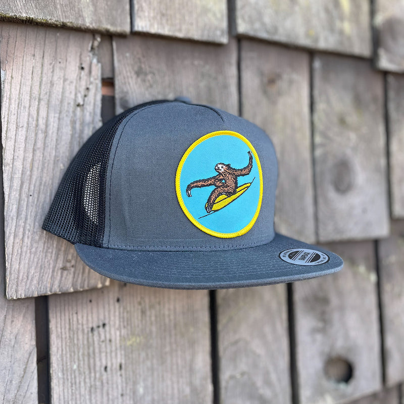 Load image into Gallery viewer, Jonas Draws Surfing Sloth Patch Hat - Charcoal Side
